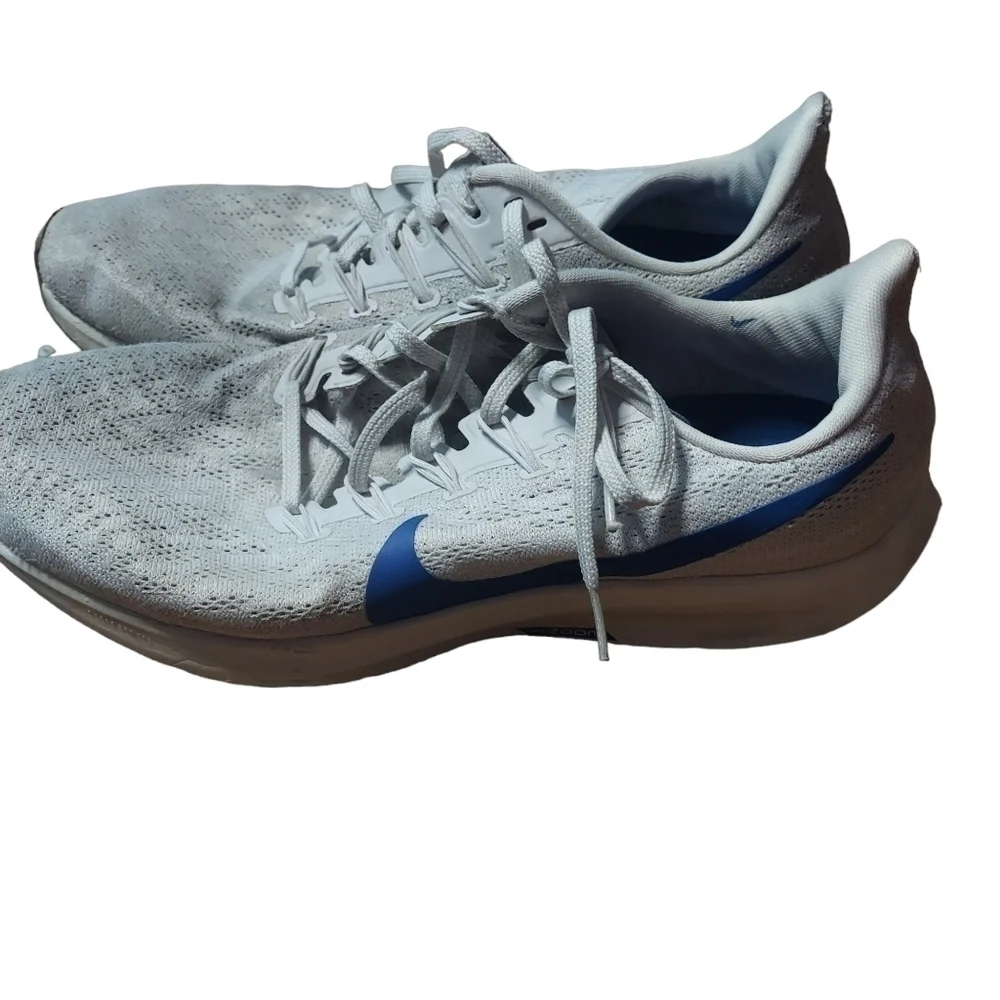 11 Nike Zoom white‎ and blue sneakers